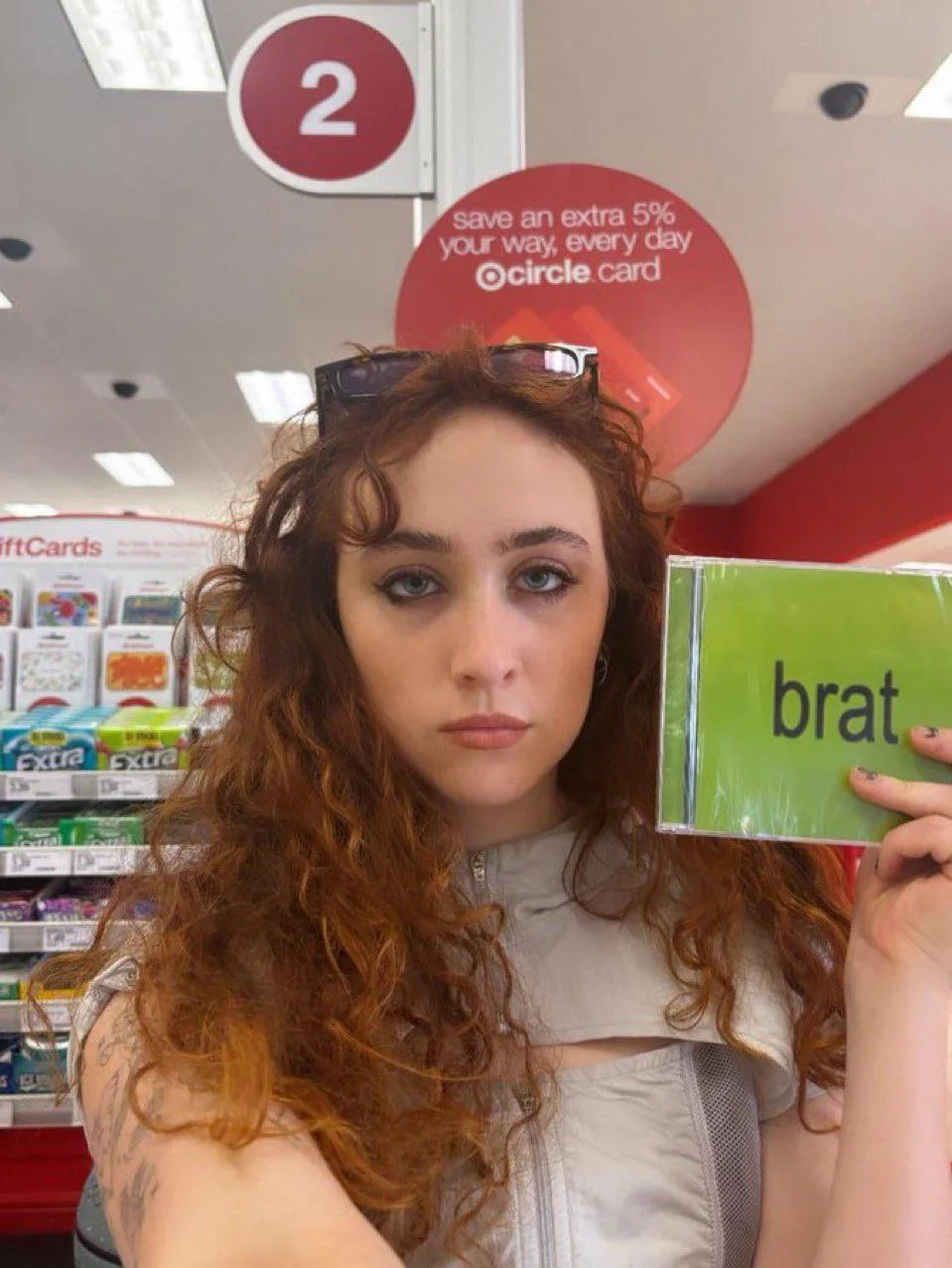 Template meme Chappell Roan holding a cd