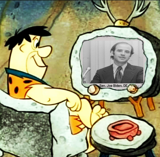 Template meme Fred Flintstones watches Sen Joe Biden on TV