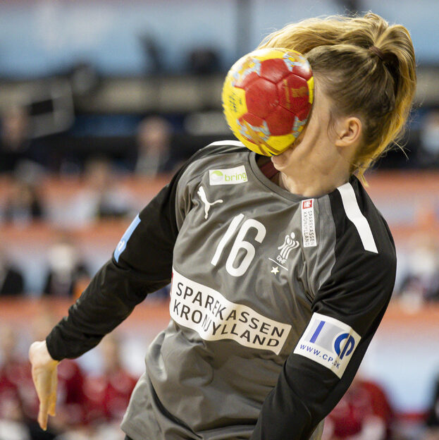 Goalkeeper stopping the ball with her face meme template