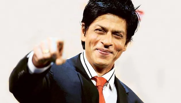 Template meme Shah Rukh Khan smiling and pointing