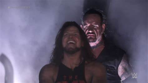 Plantilla de meme Undertaker behind Aj Styles
